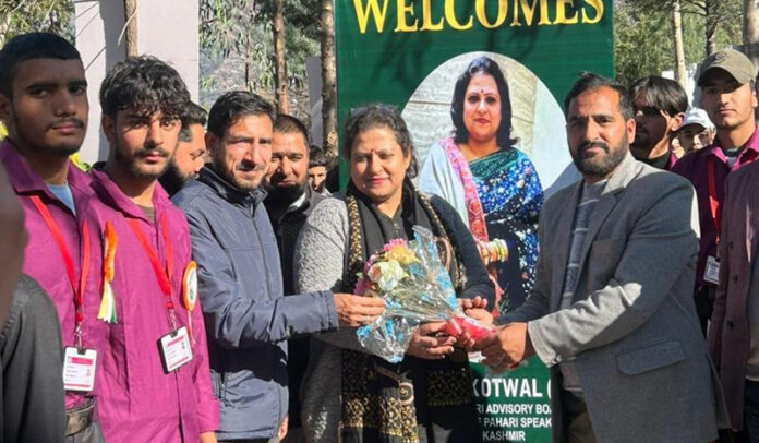 Locals greeting Sapna Kotwal with a flower bouquet during her tour of Rajouri-Poonch districts.