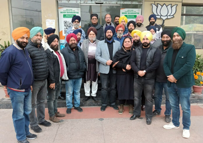 BJP Minority Morcha J&K chief Ranjodh Singh Nalwa posing with other Morcha leaders during a meeting in Jammu.