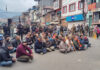 Protesters during a sit-in at Bhaderwah on Sunday. — Excelsior/Tilak Raj