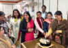 Dignitaries cutting a cake to mark the first anniversary of Bima Sakhi Scheme in Jammu on Tuesday.