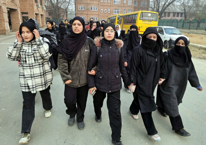 Students of Cluster University Srinagar during a protest on Saturday. -Excelsior/Shakeel Students of Cluster University Srinagar during a protest on Saturday. -Excelsior/Shakeel