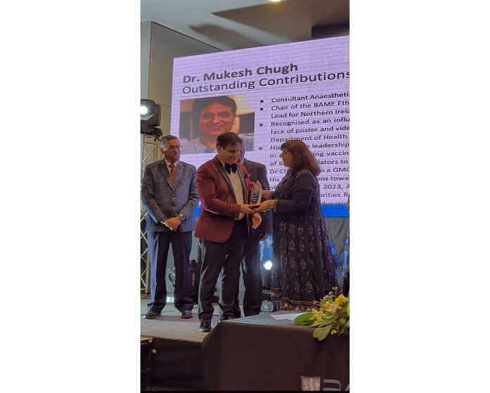 Dr Mukesh Chugh receiving UK National Award for Outstanding Contributions to Equality and Diversity.