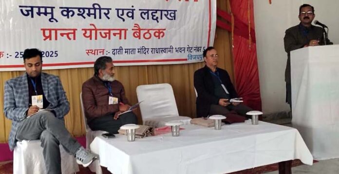 A speaker addressing a meeting organized by Arogya Bharati in Jammu.