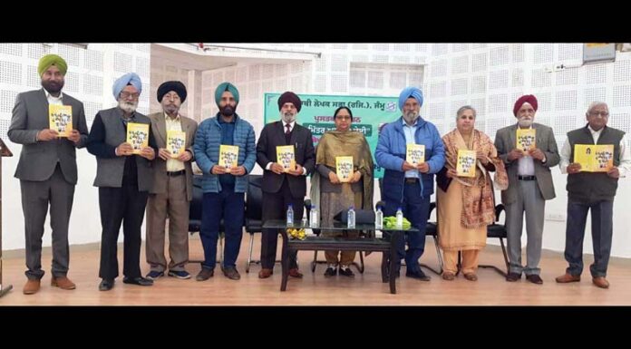 Dignitaries releasing book of Dr Monojit during a function in Jammu on Wednesday.