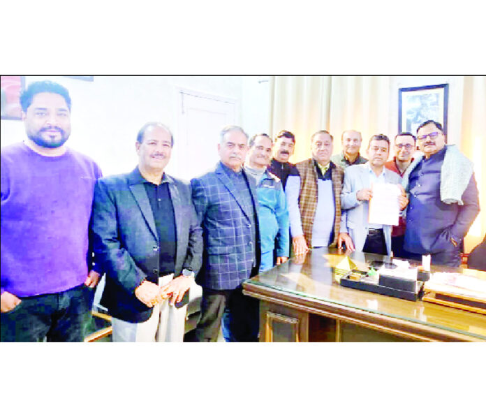 Members of Durga Nagar Welfare Coordination Committee submitting a memorandum to Minister of Jal Shakti, Javed Rana at Jammu on Tuesday. Members of Durga Nagar Welfare Coordination Committee submitting a memorandum to Minister of Jal Shakti, Javed Rana at Jammu on Tuesday.