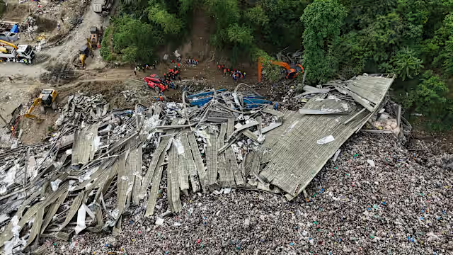 Filipino rescuers detect ‘signs of life’ in garbage  avalanche that killed 4, left dozens missing