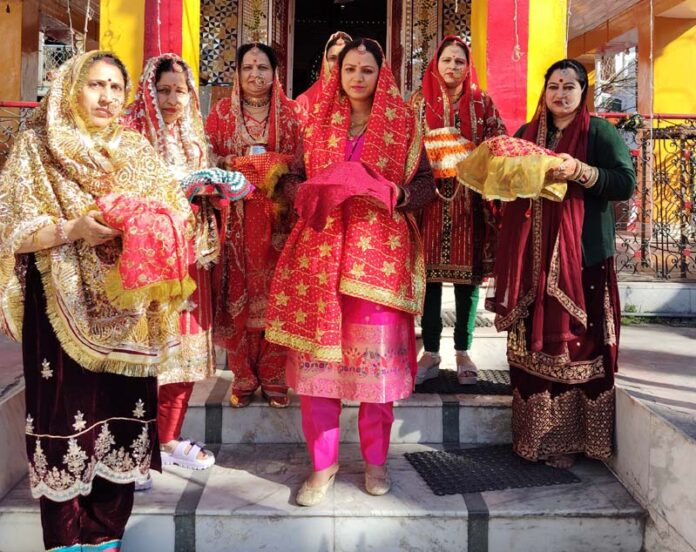 Women in bridal attires perform rituals during the Festival 'Kanchoth' in Bhaderwah on Wednesday. Women in bridal attires perform rituals during the Festival 'Kanchoth' in Bhaderwah on Wednesday.