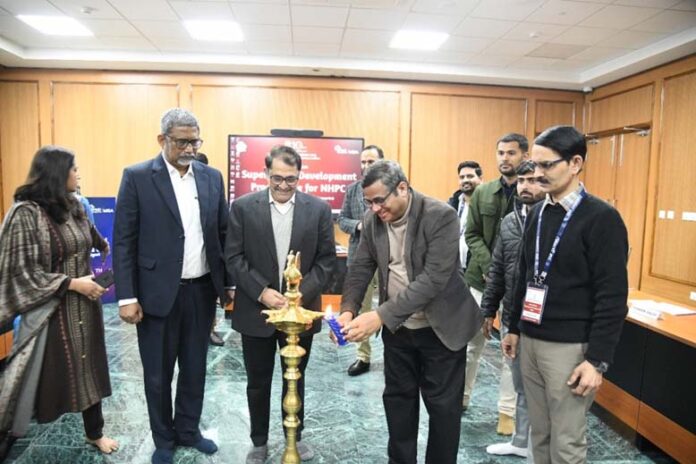 Guests lighting ceremonial lamp during inaugural of SDP at IIM Jammu