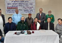 Free heart checkup camp organized Dr Sushil Sharma and his team posing with organizers during a heart checkup camp at Raghunathpura, Jammu.