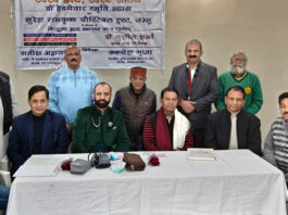 Dr Sushil Sharma and his team posing with organizers during a heart checkup camp at Raghunathpura, Jammu.
