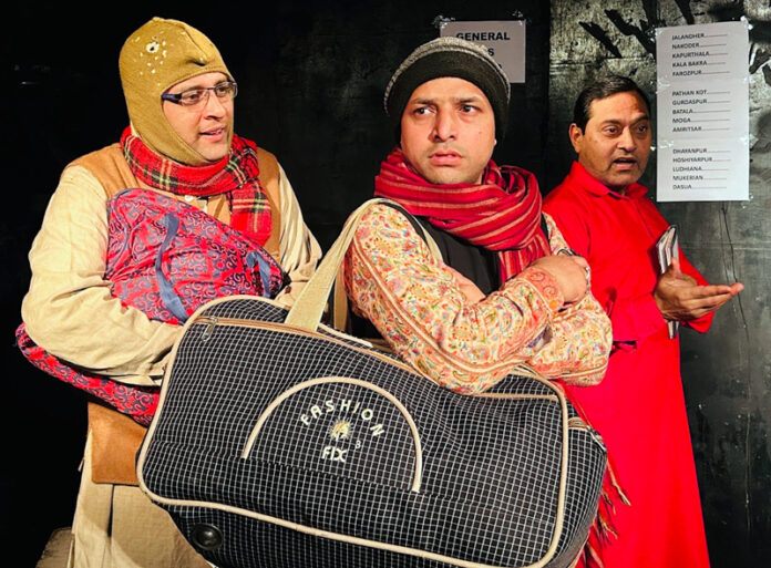Artists performing during a play staged by Natrang in Jammu.