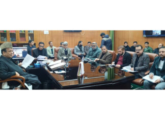 Speaker Abdul Rahim Rather chairing a meeting on Monday.