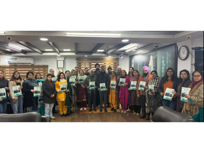 JU Vice-Chancellor and others releasing self learning material manual of CDOE.