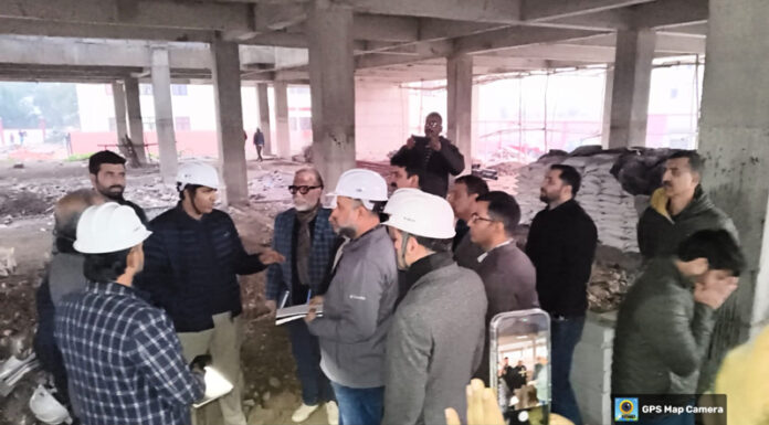 MD NHM J&K, Baseer Ul Haq Chaudhary inspecting work of under-construction 50-bedded Critical Care Block at GMC Kathua.