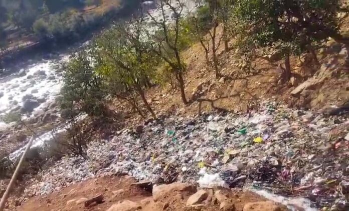 Garbage dumping station on Tawi river bank in Chenani. -Excelsior/K Kumar