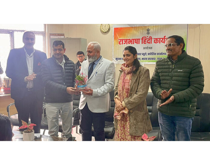 Ghulam Abbas, Director, CBC presenting a memento to Ashwani Gupta during a function in Jammu.