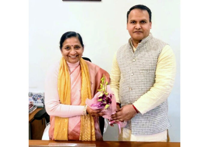 Sunil Prajapati during meeting with the MoS Nimuben Bambhaniya on Wednesday.