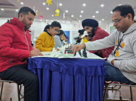 Players concentrating during a Chess game at IDPS School, Sunjwan.