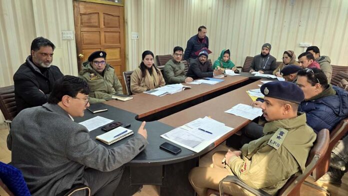 DC Minga Sherpa chairing a meeting of the District Road Safety Committee (DRSC) at Baramulla.