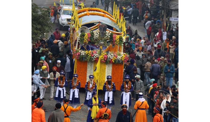 Grand Nagar-Kirtan being taken out by Sikh community in Jammu on Saturday. —Excelsior/Rakesh Grand Nagar-Kirtan being taken out by Sikh community in Jammu on Saturday. —Excelsior/Rakesh