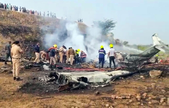 Rescue work underway after an aircraft carrying Maharashtra Deputy Chief Minister Ajit Pawar crashed during landing, at Baramati in Pune district.(PTI)