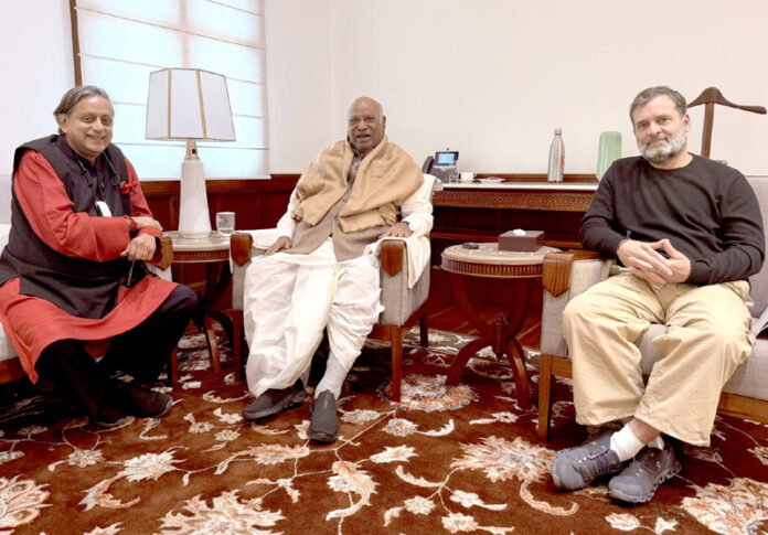 Congress MP Shashi Tharoor meets Congress MP and Lok Sabha Leader of Opposition Rahul Gandhi and Congress National President and Rajya Sabha Leader of Opposition Mallikarjun Kharge, at the Parliament in New Delhi on Thursday. (UNI)