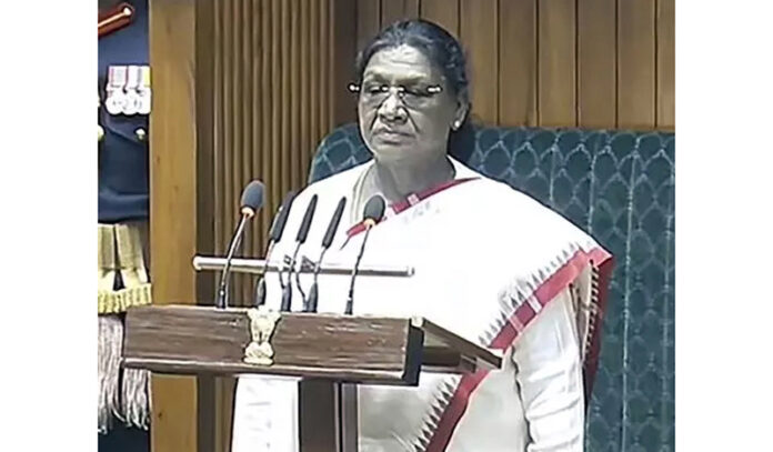 President Droupadi Murmu stands for the national anthem before her address on the first day of budget session. (PTI)