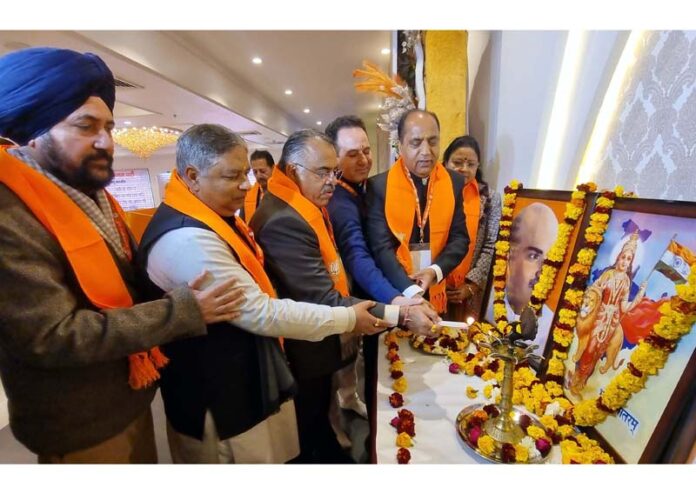 Senior BJP leaders lighting the lamp during a party workshop at Jammu on Saturday.
