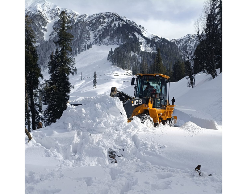 A machine clearing Chhattergalla road on Bani Highway. -Excelsior /Tilak Raj