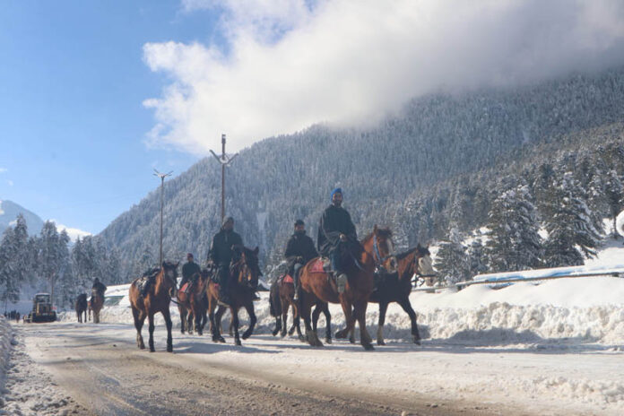 Fresh snowfall blankets Pahalgam on Wednesday.