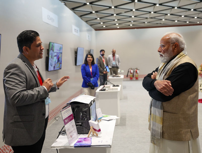 Prime Minister Narendra Modi visits an exhibition during an event on the occasion of National Startup Day and 10th Anniversary of Startup India at Bharat Mandapam in New Delhi on Friday. (UNI)