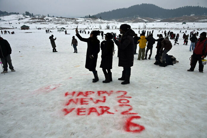 Tourists at Gulmarg on the eve of New Year on Wednesday. -Excelsior/Shakeel Tourists at Gulmarg on the eve of New Year on Wednesday. -Excelsior/Shakeel