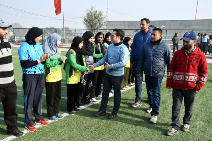 Dignitaries interacting with players before start of match.