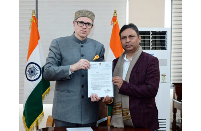 MLA Kathua, Dr Bharat Bhushan giving a memorandum to Chief Minister, Omar Abdullah at Jammu on Tuesday.