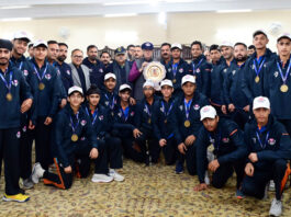 Chief Minister, Omar Abdullah along with J&K Under-16 Cricket team posing for a group photograph after winning Vijay Merchant Trophy.