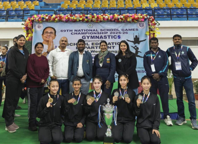 Gymnasts displaying medals while posing with dignitaries. Gymnasts displaying medals while posing with dignitaries.