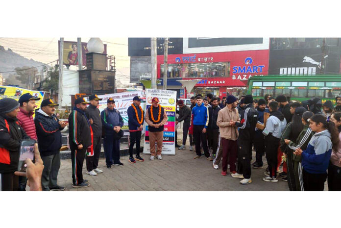 Dignitary flagging off ultra runner from Udhampur.