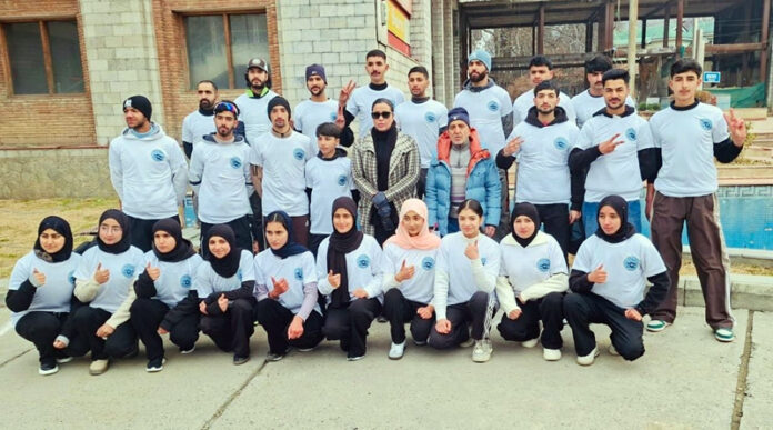 Selected Dragon Boat team posing along with dignitaries. Selected Dragon Boat team posing along with dignitaries.