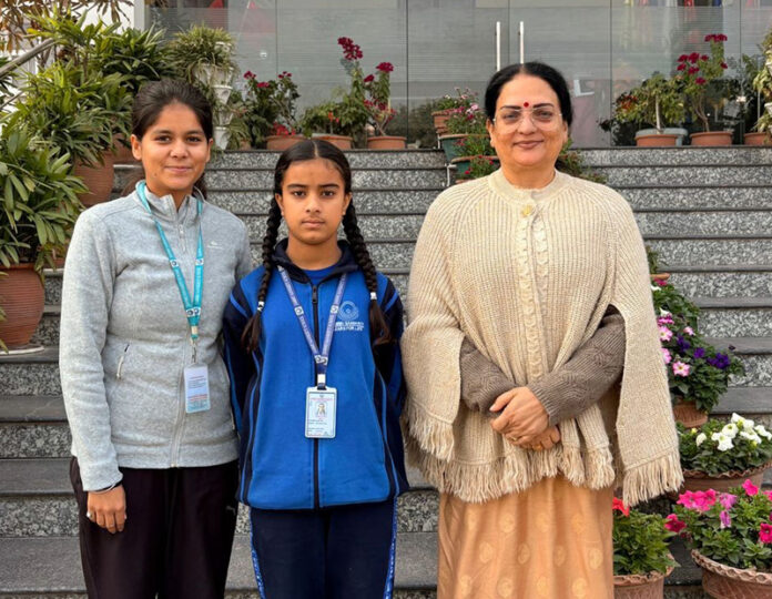 Jammu Sanskriti School’s Mamta along with her mentor and Principal pose for a photograph after she was selected for a National Taekwondo C’ship.
