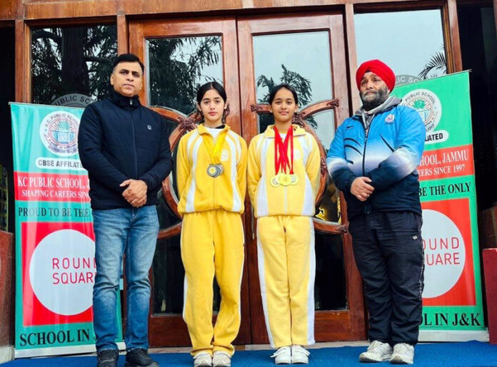 Gymnasts posing along with school management. Gymnasts posing along with school management.