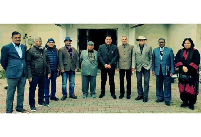 Newly elected office bearers of Defense Accounts Retired Welfare Association Jammu pose for a group photograph.