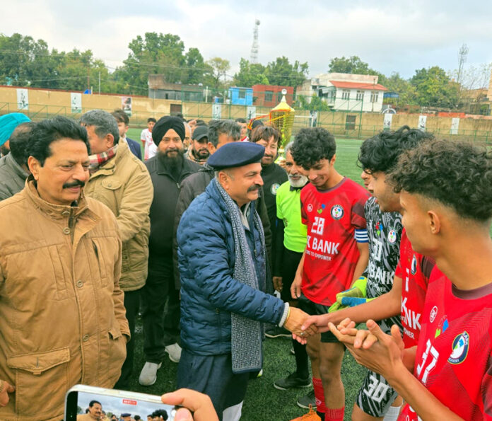Dignitary interacting with players before start of the match.