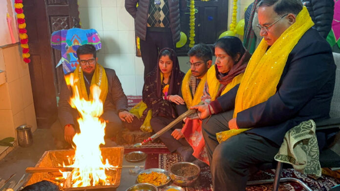 School Management performing Hawan during programme.