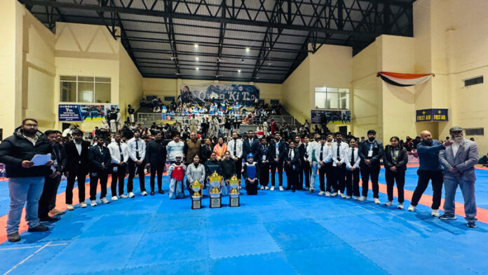 Dignitaries posing along with winners during prize distribution ceremony.