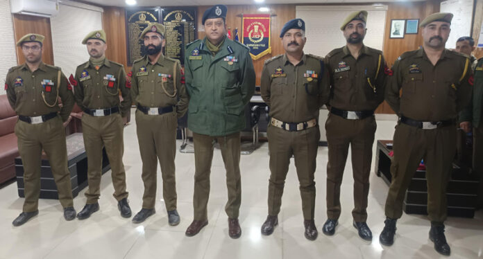 SSP Doda, Sandeep Mehta along with newly promoted SgCts posing for a photograph. —Excelsior/Tilak Raj