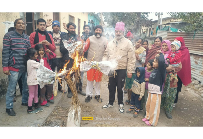 Protesters torch an effigy at Purkhu on Sunday.