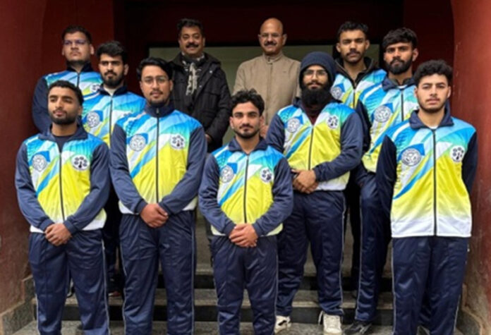 Cluster University of Jammu wrestling team posing along with management.