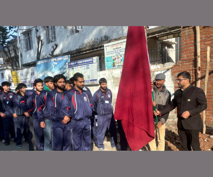 Registrar BGSBU Abhishek Sharma flagging off University sports contingent during a programme.