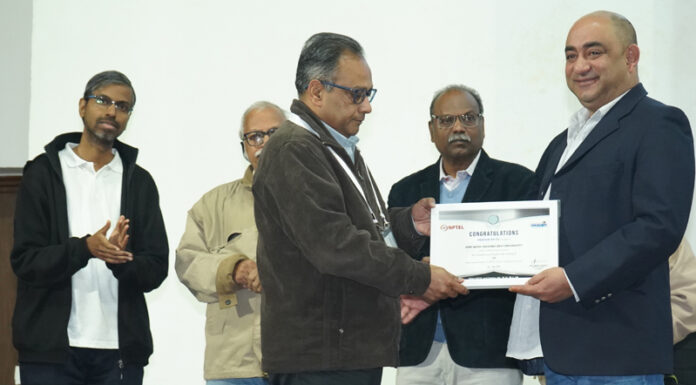 Prof. Amit Kant Pandit of SMVDU receving an award for the University at SPOC felicitation ceremony in IIT Kanpur.