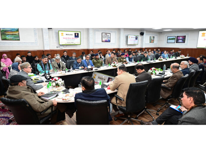 Chief Minister Omar Abdullah chairing a meeting on Monday.